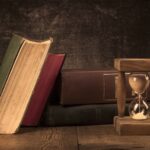 Old Books With Hourglass